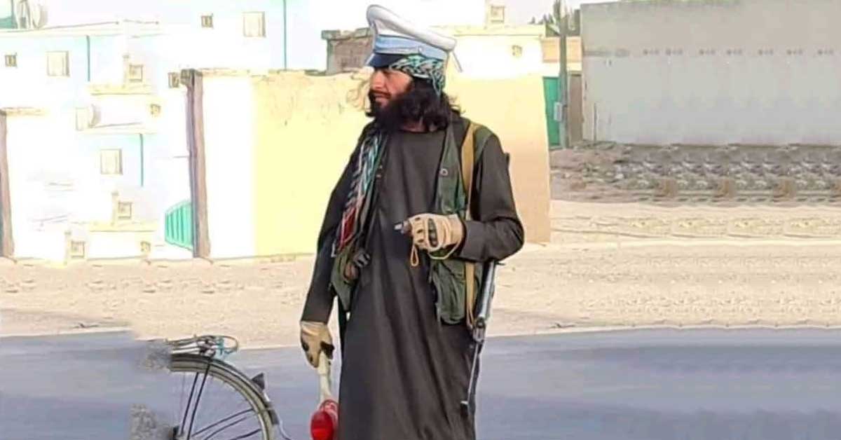 Talibani as traffic police man